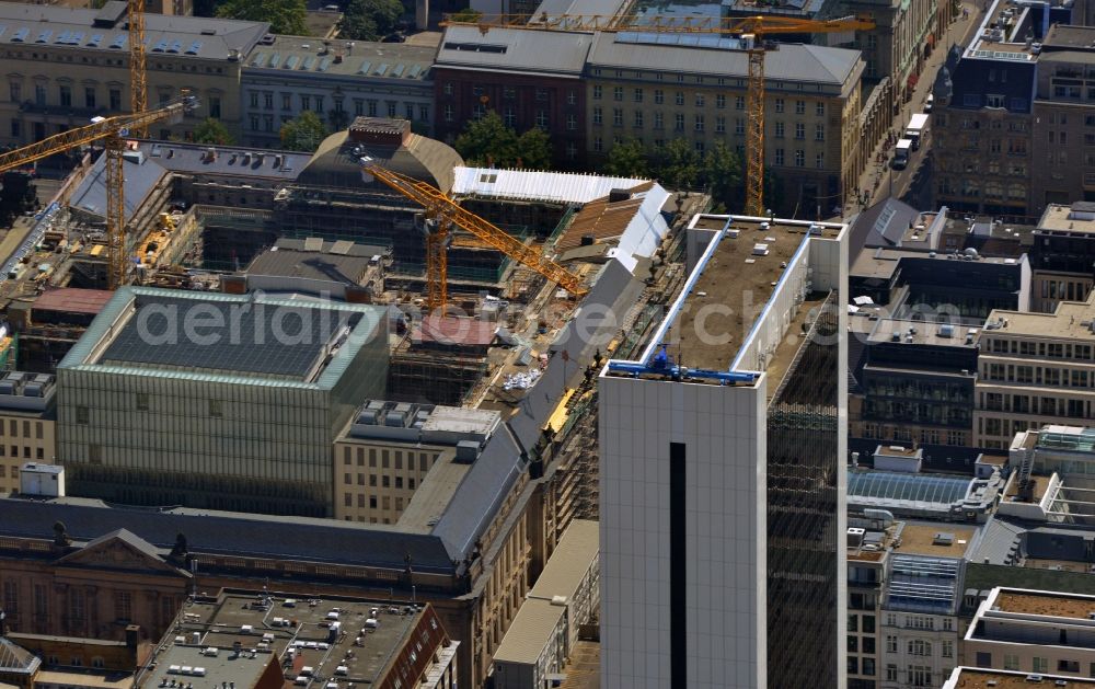 Berlin from above - Construction site for the renovation of the library Staatsbibliothek zu Berlin, on the location Unter den Linden in the district Mitte. In the foreground you can see the front of the Internationales Handelszentrum