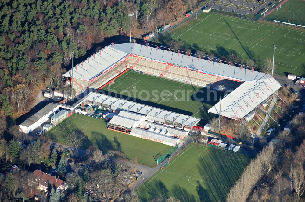 Berlin from above - View of the football stadium Alte Foersterei with its new grandstand the district of Koepenick in Berlin. The pitch is homestead for the football games of FC Union Berlin