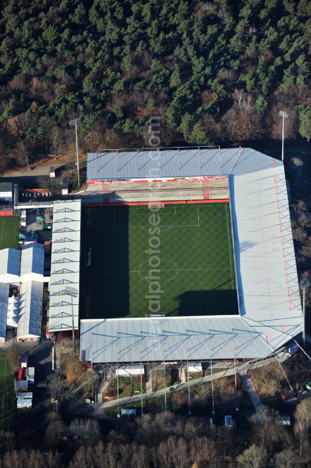 Berlin from the bird's eye view: View of the football stadium Alte Foersterei with its new grandstand the district of Koepenick in Berlin. The pitch is homestead for the football games of FC Union Berlin