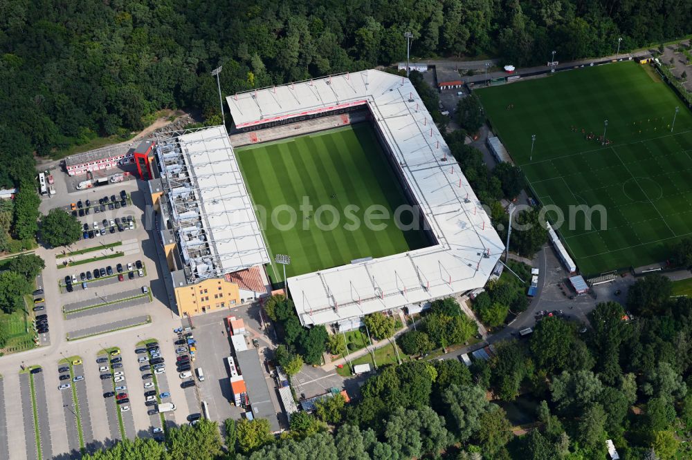 Berlin from above - View of the football stadium Alte Foersterei with its new grandstand the district of Koepenick in Berlin. The pitch is homestead for the football games of FC Union Berlin