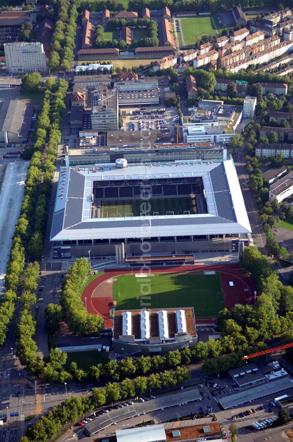 Bern from the bird's eye view: Das Stadion Stade de Suisse Wankdorf Bern steht im Wankdorfquartier der Stadt in der Schweiz. Die Arena ist Heimstatt des Berner Fussballvereins BSC Young Boys (YB) und wurde durch die Baufirma Marazzi Generalunternehmung ( heute Losinger Construction AG) und die Baltensperger AG errichtet.