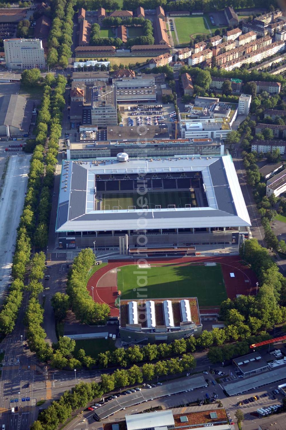 Aerial image Bern - Das Stadion Stade de Suisse Wankdorf Bern steht im Wankdorfquartier der Stadt in der Schweiz. Die Arena ist Heimstatt des Berner Fussballvereins BSC Young Boys (YB) und wurde durch die Baufirma Marazzi Generalunternehmung ( heute Losinger Construction AG) und die Baltensperger AG errichtet.