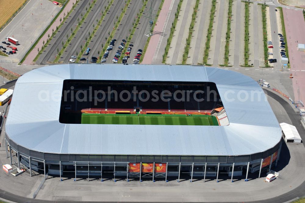 Aerial photograph Augsburg - Blick auf das Stadion impuls arena des Fußballvereins FC Augsburg zur FIFA Fußball-Weltmeisterschaft der Frauen 2011. Das Fußballstadion mit einer Kapazität von bis zu 49.000 Plätzen wurde durch die Architekten Bernhard & Kögel ralisiert. View onto the stadium impuls arena of the football club / soccer club FC Augsburg.