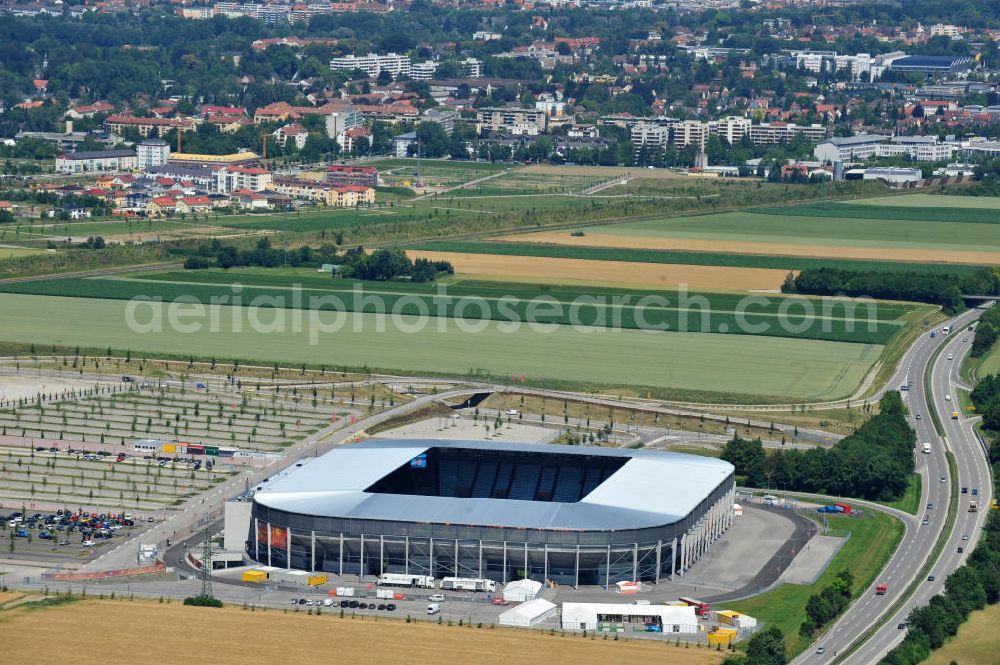 Augsburg from the bird's eye view: Blick auf das Stadion impuls arena des Fußballvereins FC Augsburg zur FIFA Fußball-Weltmeisterschaft der Frauen 2011. Das Fußballstadion mit einer Kapazität von bis zu 49.000 Plätzen wurde durch die Architekten Bernhard & Kögel ralisiert. View onto the stadium impuls arena of the football club / soccer club FC Augsburg.