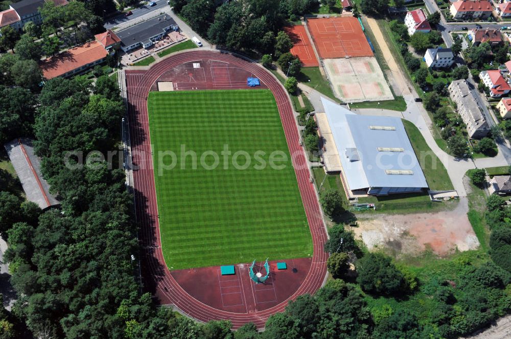 Königs Wusterhausen from the bird's eye view: View of the Stadium of Friendship at the Cottbuser street in Königs Wusterhausen. Beside the ground is the sports hall Paul-Dinter located