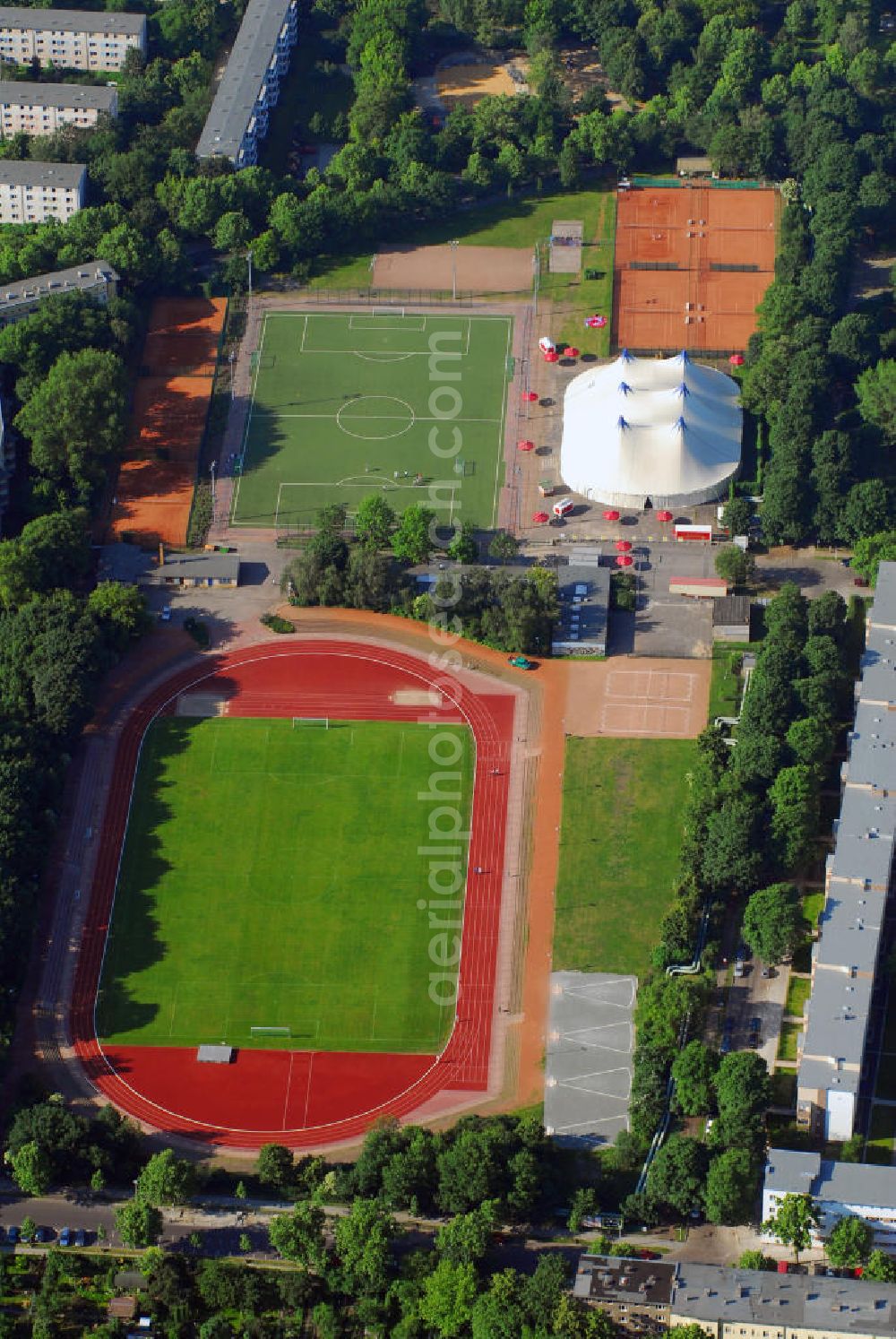 Aerial image Berlin - Blick auf das Stadion Friedrichsfelde, Heimat vom SC Borussia 1920 Lichtenberg mit Partyzelt zur Fussballweltmeisterschaft / WM. Die Kapazität liegt bei 4000. Adresse: Zachertstr. 30, 10315 Berlin. Kontakt Verein: Tel. 030 52549881, Mobile 0170 5458708