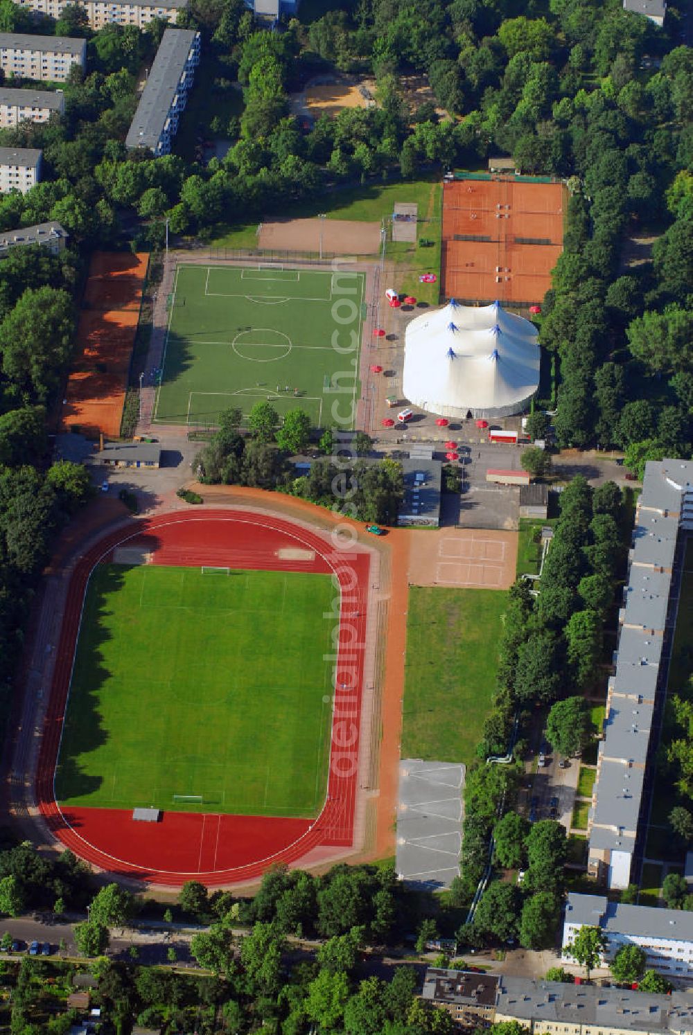 Aerial photograph Berlin - Blick auf das Stadion Friedrichsfelde, Heimat vom SC Borussia 1920 Lichtenberg mit Partyzelt zur Fussballweltmeisterschaft / WM. Die Kapazität liegt bei 4000. Adresse: Zachertstr. 30, 10315 Berlin. Kontakt Verein: Tel. 030 52549881, Mobile 0170 5458708