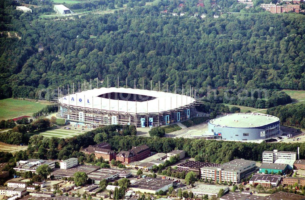 Hamburg from above - Blick auf das Stadion HSH Nordbank Arena. Diese ist eine Konzert- und Wettkampfstätte in Hamburg, die überwiegend vom Fußball-Bundesligisten Hamburger SV (HSV) genutzt wird und u.a. Austragungsort der Fußball-Weltmeisterschaft 2006 war. 2010 wird in der HSH Nordbank Arena das Finale des UEFA Cup stattfinden. Bis einschließlich 30. Juni 2001 trug es den Namen Volksparkstadion, bis einschließlich 3. Juli 2007 hieß es AOL Arena. Kontakt: HSH NORDBANK ARENA HAMBURG, HSV-Arena GmbH & CO. KG, Sylvesterallee 7, 22525 Hamburg, Tel. +49 (0)40 415531 10, Fax +49 (0)40 415531 20, e-mail: info@hsv-hshnordbank-arena.de