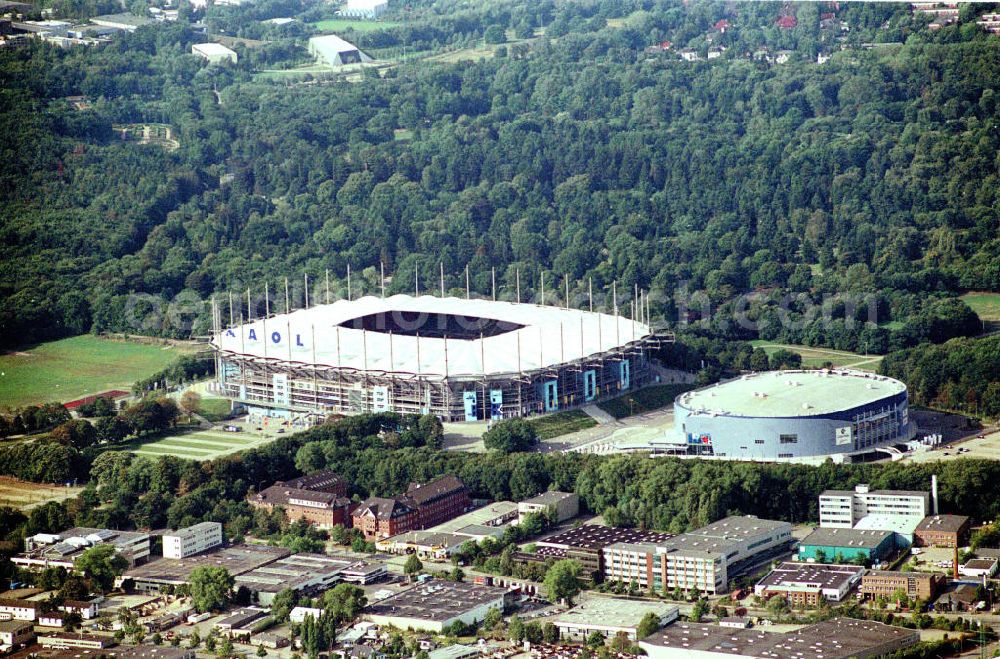 Hamburg from the bird's eye view: Blick auf das Stadion HSH Nordbank Arena. Diese ist eine Konzert- und Wettkampfstätte in Hamburg, die überwiegend vom Fußball-Bundesligisten Hamburger SV (HSV) genutzt wird und u.a. Austragungsort der Fußball-Weltmeisterschaft 2006 war. 2010 wird in der HSH Nordbank Arena das Finale des UEFA Cup stattfinden. Bis einschließlich 30. Juni 2001 trug es den Namen Volksparkstadion, bis einschließlich 3. Juli 2007 hieß es AOL Arena. Kontakt: HSH NORDBANK ARENA HAMBURG, HSV-Arena GmbH & CO. KG, Sylvesterallee 7, 22525 Hamburg, Tel. +49 (0)40 415531 10, Fax +49 (0)40 415531 20, e-mail: info@hsv-hshnordbank-arena.de