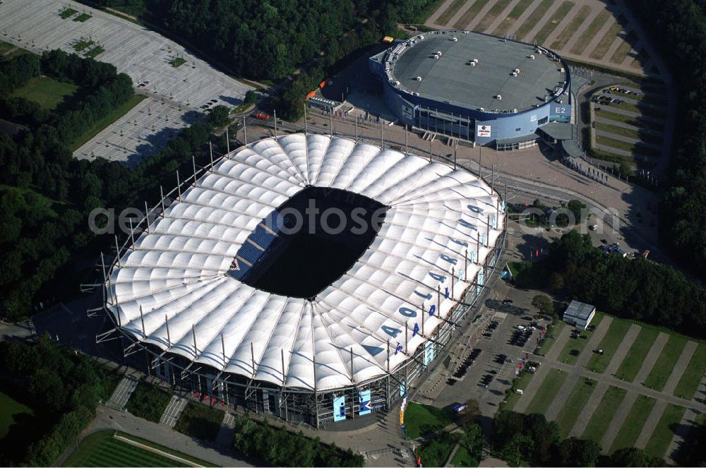 Hamburg from the bird's eye view: Blick auf das Stadion HSH Nordbank Arena. Diese ist eine Konzert- und Wettkampfstätte in Hamburg, die überwiegend vom Fußball-Bundesligisten Hamburger SV (HSV) genutzt wird und u.a. Austragungsort der Fußball-Weltmeisterschaft 2006 war. 2010 wird in der HSH Nordbank Arena das Finale des UEFA Cup stattfinden. Bis einschließlich 30. Juni 2001 trug es den Namen Volksparkstadion, bis einschließlich 3. Juli 2007 hieß es AOL Arena. Kontakt: HSH NORDBANK ARENA HAMBURG, HSV-Arena GmbH & CO. KG, Sylvesterallee 7, 22525 Hamburg, Tel. +49 (0)40 415531 10, Fax +49 (0)40 415531 20, e-mail: info@hsv-hshnordbank-arena.de