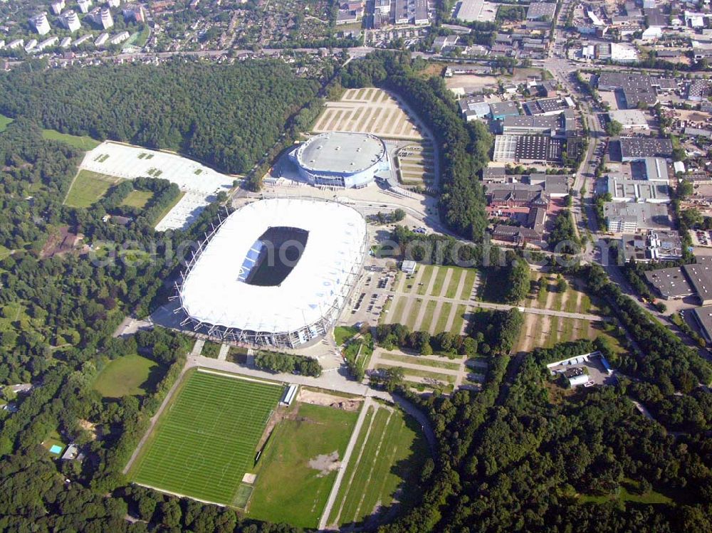 Hamburg from above - Blick auf das Stadion HSH Nordbank Arena. Diese ist eine Konzert- und Wettkampfstätte in Hamburg, die überwiegend vom Fußball-Bundesligisten Hamburger SV (HSV) genutzt wird und u.a. Austragungsort der Fußball-Weltmeisterschaft 2006 war. 2010 wird in der HSH Nordbank Arena das Finale des UEFA Cup stattfinden. Bis einschließlich 30. Juni 2001 trug es den Namen Volksparkstadion, bis einschließlich 3. Juli 2007 hieß es AOL Arena. Kontakt: HSH NORDBANK ARENA HAMBURG, HSV-Arena GmbH & CO. KG, Sylvesterallee 7, 22525 Hamburg, Tel. +49 (0)40 415531 10, Fax +49 (0)40 415531 20, e-mail: info@hsv-hshnordbank-arena.de