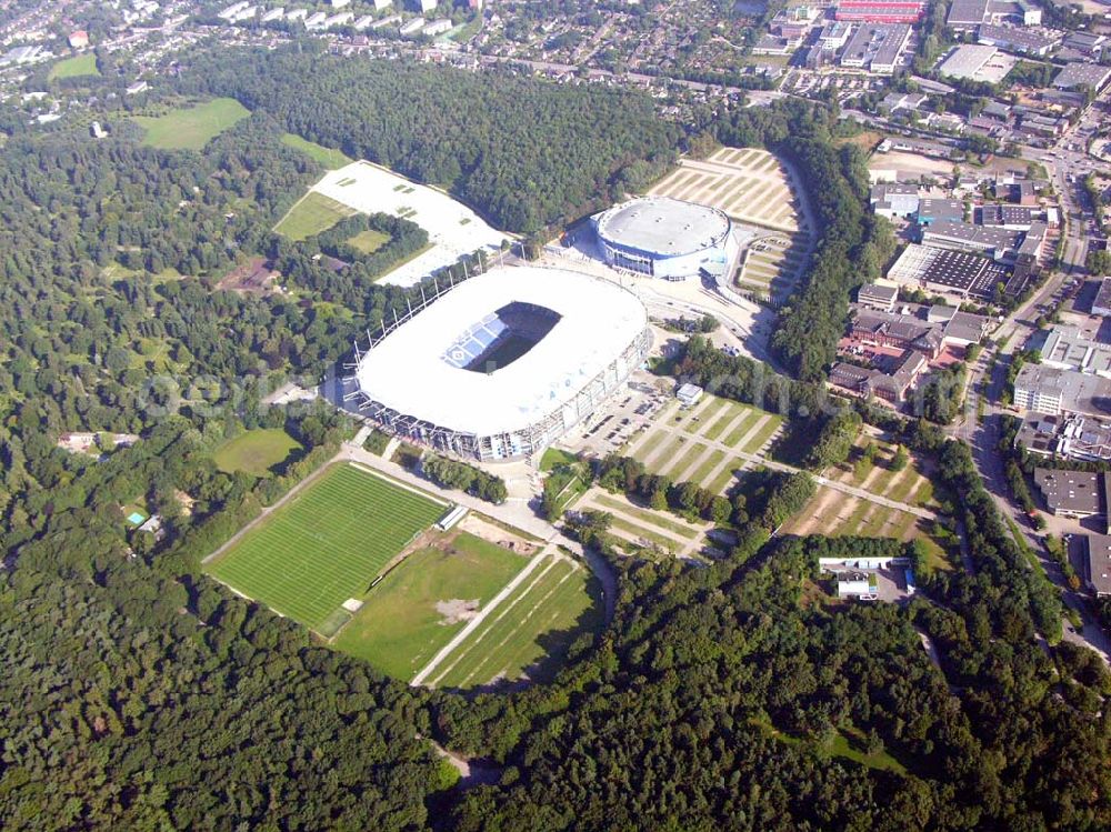 Hamburg from the bird's eye view: Blick auf das Stadion HSH Nordbank Arena. Diese ist eine Konzert- und Wettkampfstätte in Hamburg, die überwiegend vom Fußball-Bundesligisten Hamburger SV (HSV) genutzt wird und u.a. Austragungsort der Fußball-Weltmeisterschaft 2006 war. 2010 wird in der HSH Nordbank Arena das Finale des UEFA Cup stattfinden. Bis einschließlich 30. Juni 2001 trug es den Namen Volksparkstadion, bis einschließlich 3. Juli 2007 hieß es AOL Arena. Kontakt: HSH NORDBANK ARENA HAMBURG, HSV-Arena GmbH & CO. KG, Sylvesterallee 7, 22525 Hamburg, Tel. +49 (0)40 415531 10, Fax +49 (0)40 415531 20, e-mail: info@hsv-hshnordbank-arena.de