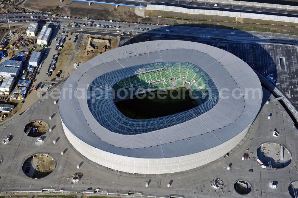 Aerial photograph Wroclaw / Breslau - Das neu errichtete Stadion Miejski in Breslau, Niederschlesien in Polen. Das Fußballstadion ist ein Austragungsort der UEFA Fußball-Europameisterschaft EM 2012. Errichtet wurde der Stadion- Neubau durch das Bauunternehmen MAX Bögl nach Entwürfen des deutschen Architekturbüros JSK. The new built stadium Miejski in Wroclaw, Lower Silesia in Poland. The soccer stadium is a venue for the UEFA European Football Championship 2012. The stadium was built by the construction company Max Bögl designed by the German architects JSK.