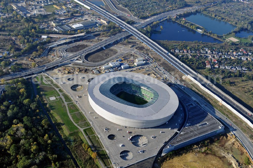 Aerial photograph Wroclaw / Breslau - Das neu errichtete Stadion Miejski in Breslau, Niederschlesien in Polen. Das Fußballstadion ist ein Austragungsort der UEFA Fußball-Europameisterschaft EM 2012. Errichtet wurde der Stadion- Neubau durch das Bauunternehmen MAX Bögl nach Entwürfen des deutschen Architekturbüros JSK. The new built stadium Miejski in Wroclaw, Lower Silesia in Poland. The soccer stadium is a venue for the UEFA European Football Championship 2012. The stadium was built by the construction company Max Bögl designed by the German architects JSK.