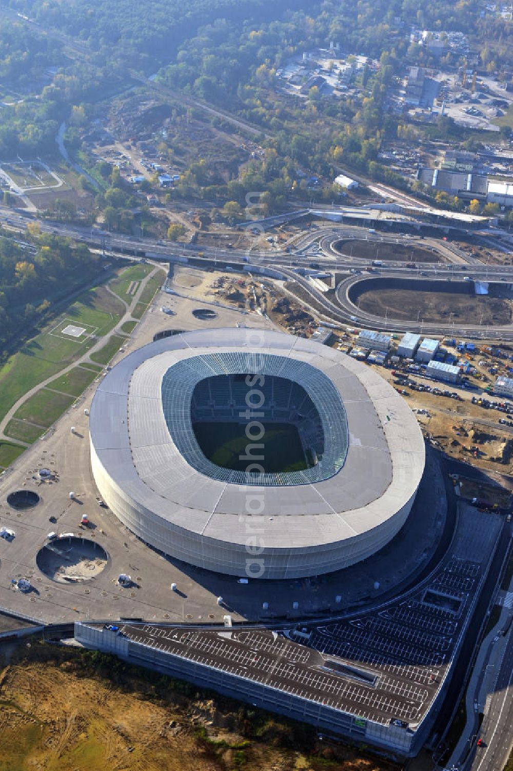 Aerial photograph Wroclaw / Breslau - Das neu errichtete Stadion Miejski in Breslau, Niederschlesien in Polen. Das Fußballstadion ist ein Austragungsort der UEFA Fußball-Europameisterschaft EM 2012. Errichtet wurde der Stadion- Neubau durch das Bauunternehmen MAX Bögl nach Entwürfen des deutschen Architekturbüros JSK. The new built stadium Miejski in Wroclaw, Lower Silesia in Poland. The soccer stadium is a venue for the UEFA European Football Championship 2012. The stadium was built by the construction company Max Bögl designed by the German architects JSK.