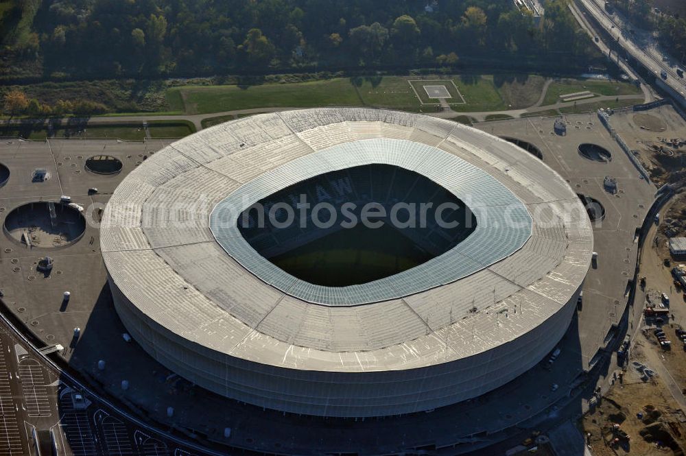 Wroclaw / Breslau from above - Das neu errichtete Stadion Miejski in Breslau, Niederschlesien in Polen. Das Fußballstadion ist ein Austragungsort der UEFA Fußball-Europameisterschaft EM 2012. Errichtet wurde der Stadion- Neubau durch das Bauunternehmen MAX Bögl nach Entwürfen des deutschen Architekturbüros JSK. The new built stadium Miejski in Wroclaw, Lower Silesia in Poland. The soccer stadium is a venue for the UEFA European Football Championship 2012. The stadium was built by the construction company Max Bögl designed by the German architects JSK.