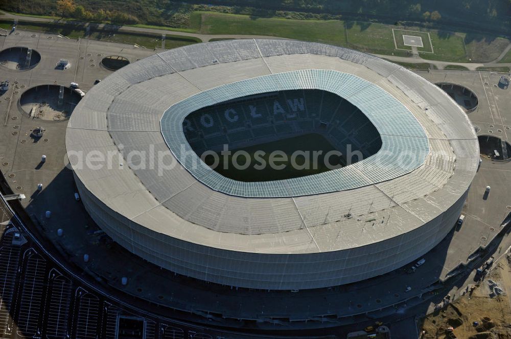 Wroclaw / Breslau from the bird's eye view: Das neu errichtete Stadion Miejski in Breslau, Niederschlesien in Polen. Das Fußballstadion ist ein Austragungsort der UEFA Fußball-Europameisterschaft EM 2012. Errichtet wurde der Stadion- Neubau durch das Bauunternehmen MAX Bögl nach Entwürfen des deutschen Architekturbüros JSK. The new built stadium Miejski in Wroclaw, Lower Silesia in Poland. The soccer stadium is a venue for the UEFA European Football Championship 2012. The stadium was built by the construction company Max Bögl designed by the German architects JSK.