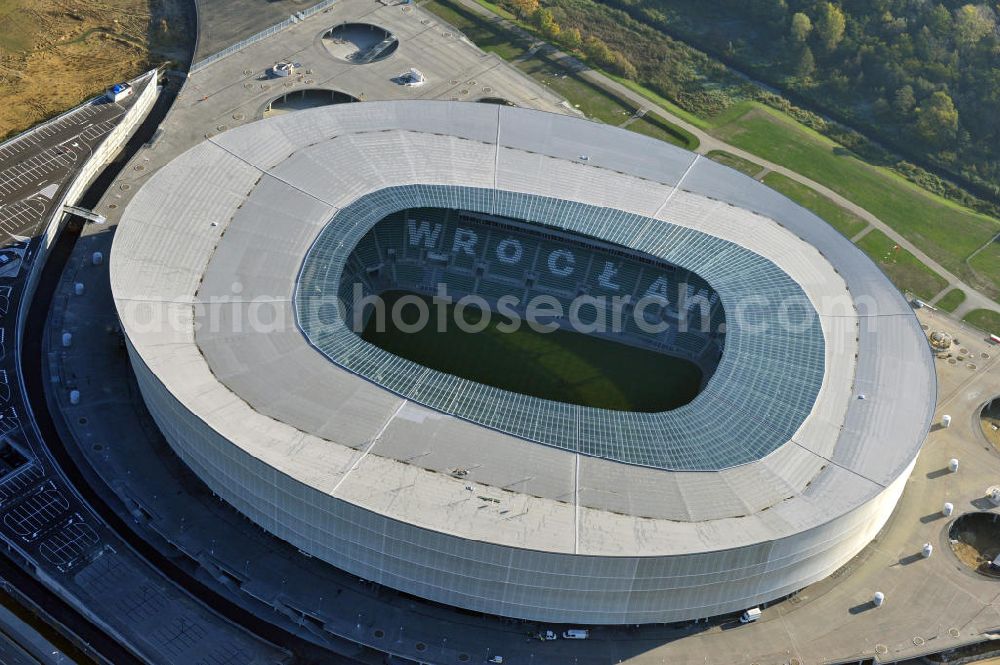 Aerial photograph Wroclaw / Breslau - Das neu errichtete Stadion Miejski in Breslau, Niederschlesien in Polen. Das Fußballstadion ist ein Austragungsort der UEFA Fußball-Europameisterschaft EM 2012. Errichtet wurde der Stadion- Neubau durch das Bauunternehmen MAX Bögl nach Entwürfen des deutschen Architekturbüros JSK. The new built stadium Miejski in Wroclaw, Lower Silesia in Poland. The soccer stadium is a venue for the UEFA European Football Championship 2012. The stadium was built by the construction company Max Bögl designed by the German architects JSK.