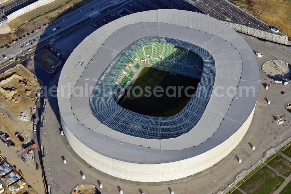 Aerial image Wroclaw / Breslau - Das neu errichtete Stadion Miejski in Breslau, Niederschlesien in Polen. Das Fußballstadion ist ein Austragungsort der UEFA Fußball-Europameisterschaft EM 2012. Errichtet wurde der Stadion- Neubau durch das Bauunternehmen MAX Bögl nach Entwürfen des deutschen Architekturbüros JSK. The new built stadium Miejski in Wroclaw, Lower Silesia in Poland. The soccer stadium is a venue for the UEFA European Football Championship 2012. The stadium was built by the construction company Max Bögl designed by the German architects JSK.