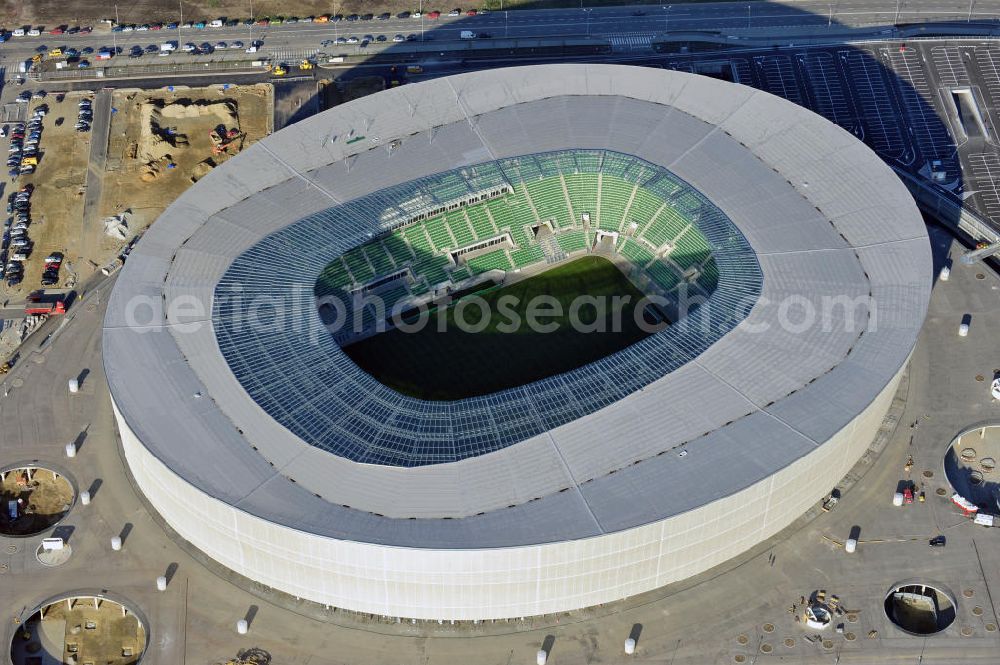 Aerial photograph Wroclaw / Breslau - Das neu errichtete Stadion Miejski in Breslau, Niederschlesien in Polen. Das Fußballstadion ist ein Austragungsort der UEFA Fußball-Europameisterschaft EM 2012. Errichtet wurde der Stadion- Neubau durch das Bauunternehmen MAX Bögl nach Entwürfen des deutschen Architekturbüros JSK. The new built stadium Miejski in Wroclaw, Lower Silesia in Poland. The soccer stadium is a venue for the UEFA European Football Championship 2012. The stadium was built by the construction company Max Bögl designed by the German architects JSK.