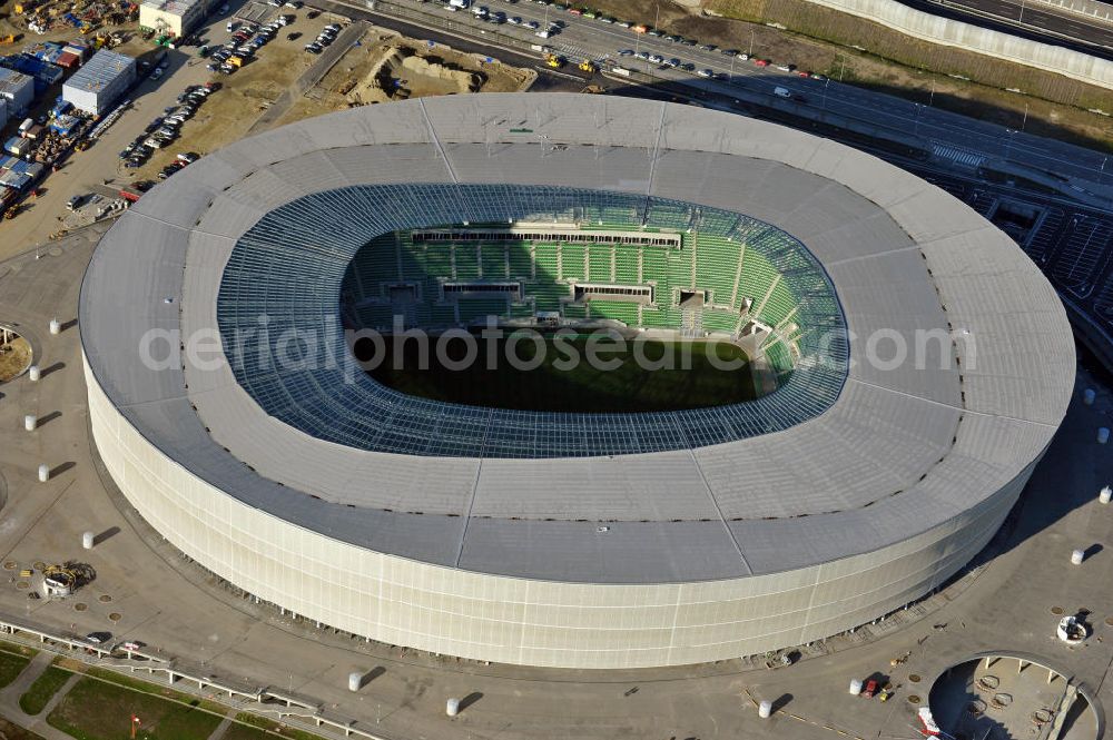 Aerial image Wroclaw / Breslau - Das neu errichtete Stadion Miejski in Breslau, Niederschlesien in Polen. Das Fußballstadion ist ein Austragungsort der UEFA Fußball-Europameisterschaft EM 2012. Errichtet wurde der Stadion- Neubau durch das Bauunternehmen MAX Bögl nach Entwürfen des deutschen Architekturbüros JSK. The new built stadium Miejski in Wroclaw, Lower Silesia in Poland. The soccer stadium is a venue for the UEFA European Football Championship 2012. The stadium was built by the construction company Max Bögl designed by the German architects JSK.