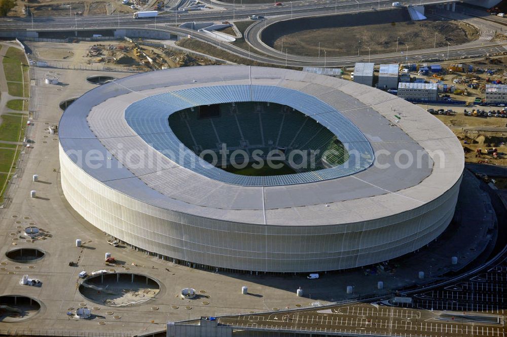 Aerial image Wroclaw / Breslau - Das neu errichtete Stadion Miejski in Breslau, Niederschlesien in Polen. Das Fußballstadion ist ein Austragungsort der UEFA Fußball-Europameisterschaft EM 2012. Errichtet wurde der Stadion- Neubau durch das Bauunternehmen MAX Bögl nach Entwürfen des deutschen Architekturbüros JSK. The new built stadium Miejski in Wroclaw, Lower Silesia in Poland. The soccer stadium is a venue for the UEFA European Football Championship 2012. The stadium was built by the construction company Max Bögl designed by the German architects JSK.