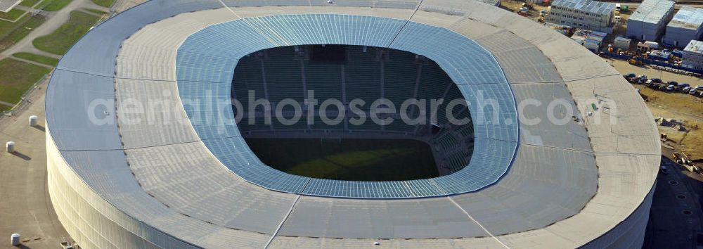 Wroclaw / Breslau from above - Das neu errichtete Stadion Miejski in Breslau, Niederschlesien in Polen. Das Fußballstadion ist ein Austragungsort der UEFA Fußball-Europameisterschaft EM 2012. Errichtet wurde der Stadion- Neubau durch das Bauunternehmen MAX Bögl nach Entwürfen des deutschen Architekturbüros JSK. The new built stadium Miejski in Wroclaw, Lower Silesia in Poland. The soccer stadium is a venue for the UEFA European Football Championship 2012. The stadium was built by the construction company Max Bögl designed by the German architects JSK.