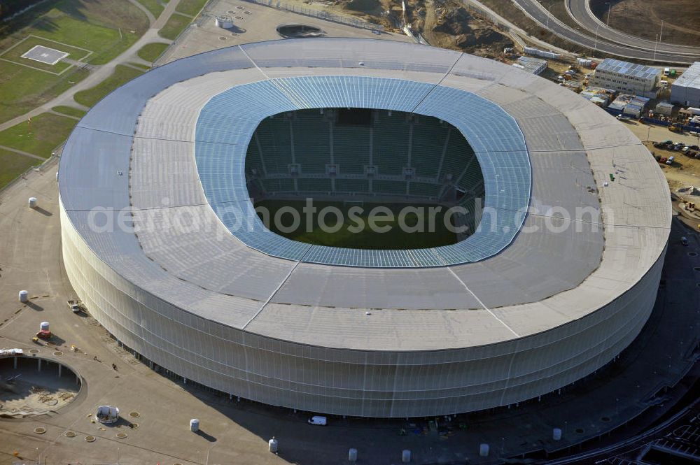 Wroclaw / Breslau from the bird's eye view: Das neu errichtete Stadion Miejski in Breslau, Niederschlesien in Polen. Das Fußballstadion ist ein Austragungsort der UEFA Fußball-Europameisterschaft EM 2012. Errichtet wurde der Stadion- Neubau durch das Bauunternehmen MAX Bögl nach Entwürfen des deutschen Architekturbüros JSK. The new built stadium Miejski in Wroclaw, Lower Silesia in Poland. The soccer stadium is a venue for the UEFA European Football Championship 2012. The stadium was built by the construction company Max Bögl designed by the German architects JSK.