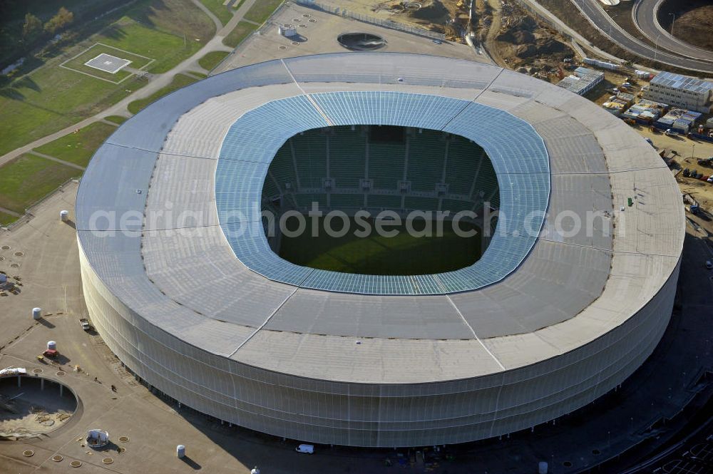 Aerial image Wroclaw / Breslau - Das neu errichtete Stadion Miejski in Breslau, Niederschlesien in Polen. Das Fußballstadion ist ein Austragungsort der UEFA Fußball-Europameisterschaft EM 2012. Errichtet wurde der Stadion- Neubau durch das Bauunternehmen MAX Bögl nach Entwürfen des deutschen Architekturbüros JSK. The new built stadium Miejski in Wroclaw, Lower Silesia in Poland. The soccer stadium is a venue for the UEFA European Football Championship 2012. The stadium was built by the construction company Max Bögl designed by the German architects JSK.