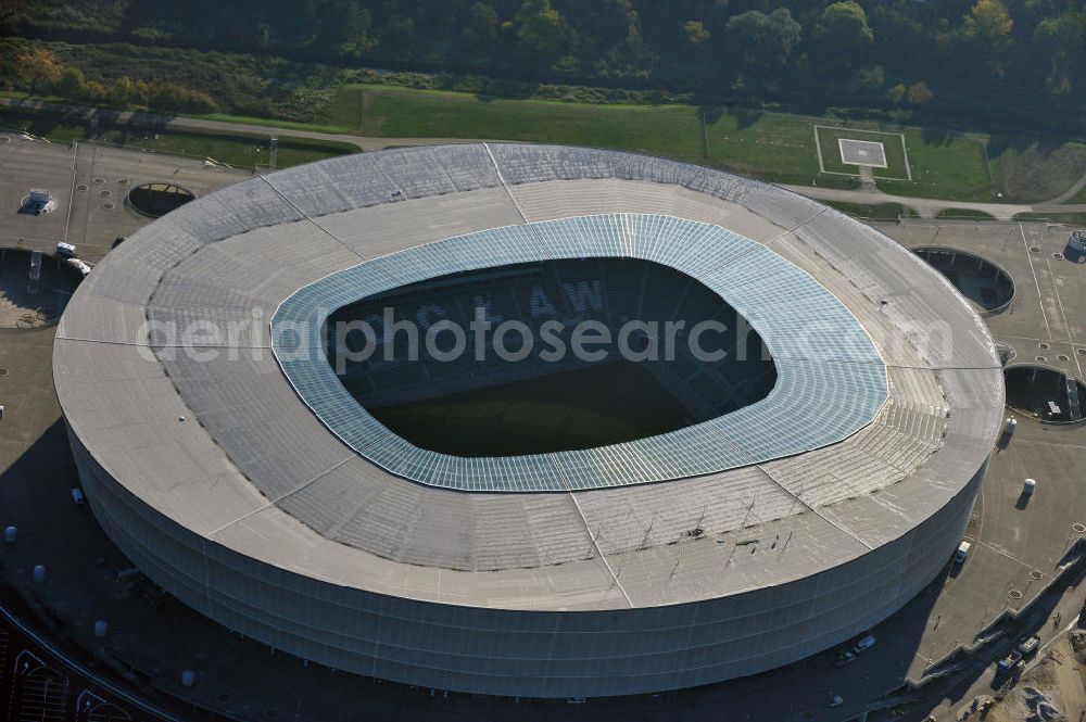 Wroclaw / Breslau from the bird's eye view: Das neu errichtete Stadion Miejski in Breslau, Niederschlesien in Polen. Das Fußballstadion ist ein Austragungsort der UEFA Fußball-Europameisterschaft EM 2012. Errichtet wurde der Stadion- Neubau durch das Bauunternehmen MAX Bögl nach Entwürfen des deutschen Architekturbüros JSK. The new built stadium Miejski in Wroclaw, Lower Silesia in Poland. The soccer stadium is a venue for the UEFA European Football Championship 2012. The stadium was built by the construction company Max Bögl designed by the German architects JSK.