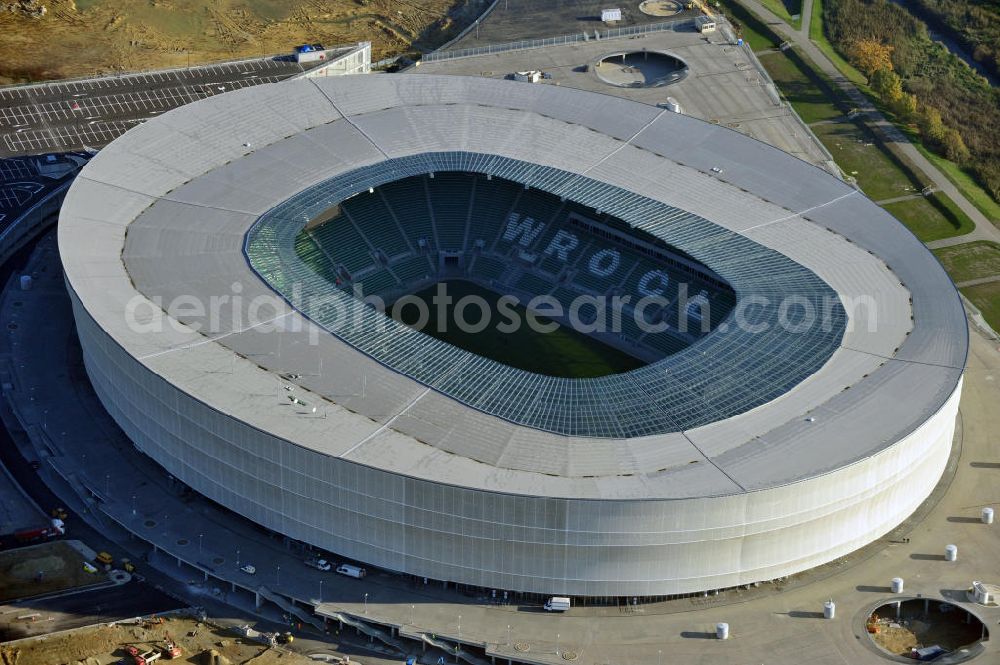 Wroclaw / Breslau from the bird's eye view: Das neu errichtete Stadion Miejski in Breslau, Niederschlesien in Polen. Das Fußballstadion ist ein Austragungsort der UEFA Fußball-Europameisterschaft EM 2012. Errichtet wurde der Stadion- Neubau durch das Bauunternehmen MAX Bögl nach Entwürfen des deutschen Architekturbüros JSK. The new built stadium Miejski in Wroclaw, Lower Silesia in Poland. The soccer stadium is a venue for the UEFA European Football Championship 2012. The stadium was built by the construction company Max Bögl designed by the German architects JSK.