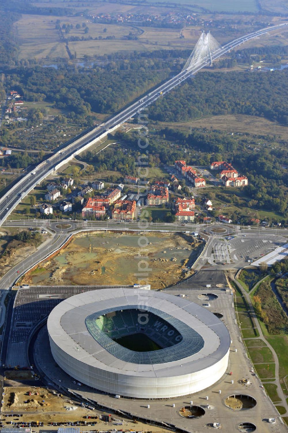 Aerial image Wroclaw / Breslau - Das neu errichtete Stadion Miejski in Breslau, Niederschlesien in Polen. Das Fußballstadion ist ein Austragungsort der UEFA Fußball-Europameisterschaft EM 2012. Errichtet wurde der Stadion- Neubau durch das Bauunternehmen MAX Bögl nach Entwürfen des deutschen Architekturbüros JSK. The new built stadium Miejski in Wroclaw, Lower Silesia in Poland. The soccer stadium is a venue for the UEFA European Football Championship 2012. The stadium was built by the construction company Max Bögl designed by the German architects JSK.