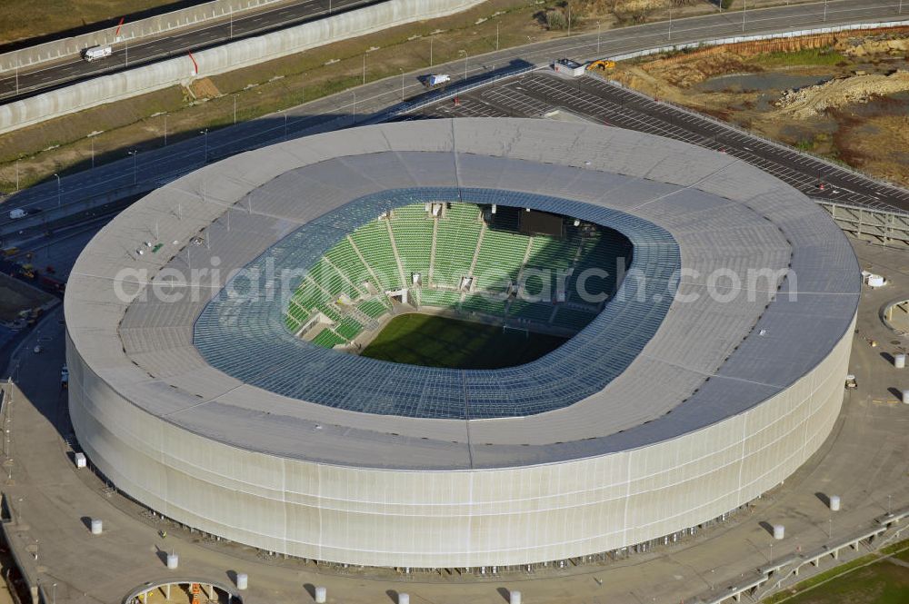 Wroclaw / Breslau from the bird's eye view: Das neu errichtete Stadion Miejski in Breslau, Niederschlesien in Polen. Das Fußballstadion ist ein Austragungsort der UEFA Fußball-Europameisterschaft EM 2012. Errichtet wurde der Stadion- Neubau durch das Bauunternehmen MAX Bögl nach Entwürfen des deutschen Architekturbüros JSK. The new built stadium Miejski in Wroclaw, Lower Silesia in Poland. The soccer stadium is a venue for the UEFA European Football Championship 2012. The stadium was built by the construction company Max Bögl designed by the German architects JSK.