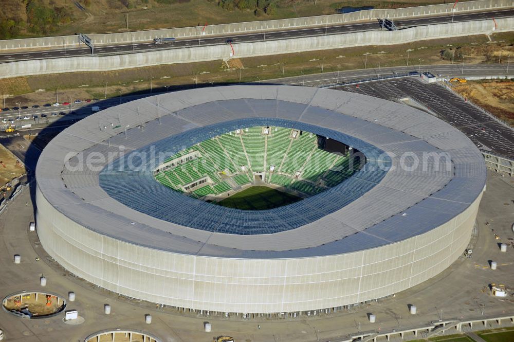 Aerial photograph Wroclaw / Breslau - Das neu errichtete Stadion Miejski in Breslau, Niederschlesien in Polen. Das Fußballstadion ist ein Austragungsort der UEFA Fußball-Europameisterschaft EM 2012. Errichtet wurde der Stadion- Neubau durch das Bauunternehmen MAX Bögl nach Entwürfen des deutschen Architekturbüros JSK. The new built stadium Miejski in Wroclaw, Lower Silesia in Poland. The soccer stadium is a venue for the UEFA European Football Championship 2012. The stadium was built by the construction company Max Bögl designed by the German architects JSK.