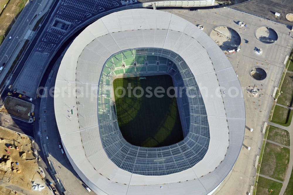 Aerial photograph Wroclaw / Breslau - Das neu errichtete Stadion Miejski in Breslau, Niederschlesien in Polen. Das Fußballstadion ist ein Austragungsort der UEFA Fußball-Europameisterschaft EM 2012. Errichtet wurde der Stadion- Neubau durch das Bauunternehmen MAX Bögl nach Entwürfen des deutschen Architekturbüros JSK. The new built stadium Miejski in Wroclaw, Lower Silesia in Poland. The soccer stadium is a venue for the UEFA European Football Championship 2012. The stadium was built by the construction company Max Bögl designed by the German architects JSK.