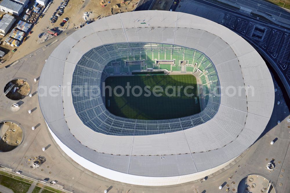 Aerial image Wroclaw / Breslau - Das neu errichtete Stadion Miejski in Breslau, Niederschlesien in Polen. Das Fußballstadion ist ein Austragungsort der UEFA Fußball-Europameisterschaft EM 2012. Errichtet wurde der Stadion- Neubau durch das Bauunternehmen MAX Bögl nach Entwürfen des deutschen Architekturbüros JSK. The new built stadium Miejski in Wroclaw, Lower Silesia in Poland. The soccer stadium is a venue for the UEFA European Football Championship 2012. The stadium was built by the construction company Max Bögl designed by the German architects JSK.