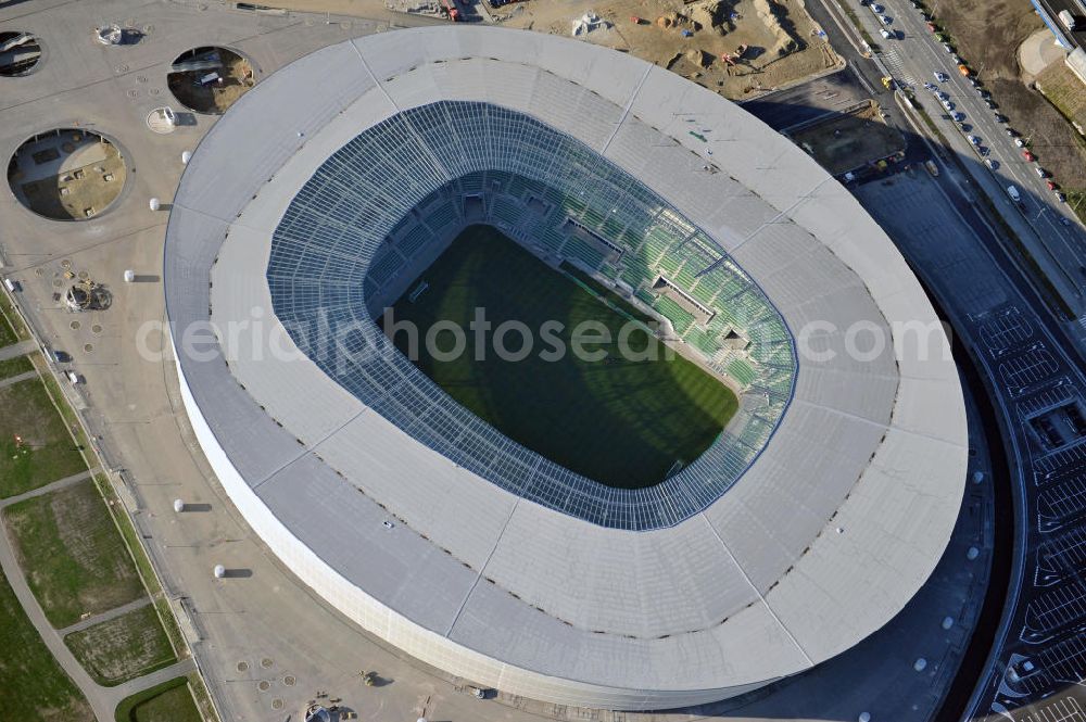 Aerial photograph Wroclaw / Breslau - Das neu errichtete Stadion Miejski in Breslau, Niederschlesien in Polen. Das Fußballstadion ist ein Austragungsort der UEFA Fußball-Europameisterschaft EM 2012. Errichtet wurde der Stadion- Neubau durch das Bauunternehmen MAX Bögl nach Entwürfen des deutschen Architekturbüros JSK. The new built stadium Miejski in Wroclaw, Lower Silesia in Poland. The soccer stadium is a venue for the UEFA European Football Championship 2012. The stadium was built by the construction company Max Bögl designed by the German architects JSK.