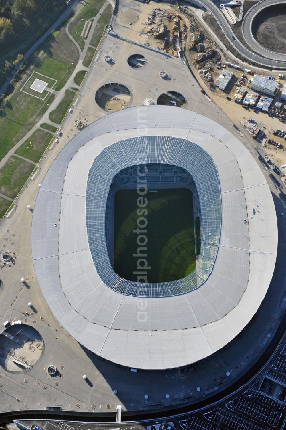 Wroclaw / Breslau from the bird's eye view: Das neu errichtete Stadion Miejski in Breslau, Niederschlesien in Polen. Das Fußballstadion ist ein Austragungsort der UEFA Fußball-Europameisterschaft EM 2012. Errichtet wurde der Stadion- Neubau durch das Bauunternehmen MAX Bögl nach Entwürfen des deutschen Architekturbüros JSK. The new built stadium Miejski in Wroclaw, Lower Silesia in Poland. The soccer stadium is a venue for the UEFA European Football Championship 2012. The stadium was built by the construction company Max Bögl designed by the German architects JSK.