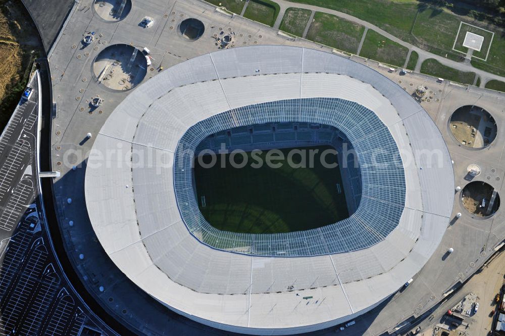 Aerial image Wroclaw / Breslau - Das neu errichtete Stadion Miejski in Breslau, Niederschlesien in Polen. Das Fußballstadion ist ein Austragungsort der UEFA Fußball-Europameisterschaft EM 2012. Errichtet wurde der Stadion- Neubau durch das Bauunternehmen MAX Bögl nach Entwürfen des deutschen Architekturbüros JSK. The new built stadium Miejski in Wroclaw, Lower Silesia in Poland. The soccer stadium is a venue for the UEFA European Football Championship 2012. The stadium was built by the construction company Max Bögl designed by the German architects JSK.