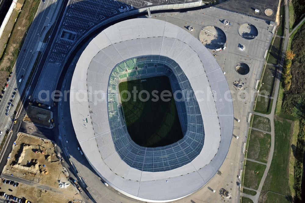 Aerial photograph Wroclaw / Breslau - Das neu errichtete Stadion Miejski in Breslau, Niederschlesien in Polen. Das Fußballstadion ist ein Austragungsort der UEFA Fußball-Europameisterschaft EM 2012. Errichtet wurde der Stadion- Neubau durch das Bauunternehmen MAX Bögl nach Entwürfen des deutschen Architekturbüros JSK. The new built stadium Miejski in Wroclaw, Lower Silesia in Poland. The soccer stadium is a venue for the UEFA European Football Championship 2012. The stadium was built by the construction company Max Bögl designed by the German architects JSK.