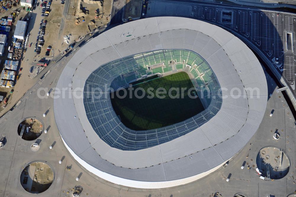 Wroclaw / Breslau from the bird's eye view: Das neu errichtete Stadion Miejski in Breslau, Niederschlesien in Polen. Das Fußballstadion ist ein Austragungsort der UEFA Fußball-Europameisterschaft EM 2012. Errichtet wurde der Stadion- Neubau durch das Bauunternehmen MAX Bögl nach Entwürfen des deutschen Architekturbüros JSK. The new built stadium Miejski in Wroclaw, Lower Silesia in Poland. The soccer stadium is a venue for the UEFA European Football Championship 2012. The stadium was built by the construction company Max Bögl designed by the German architects JSK.