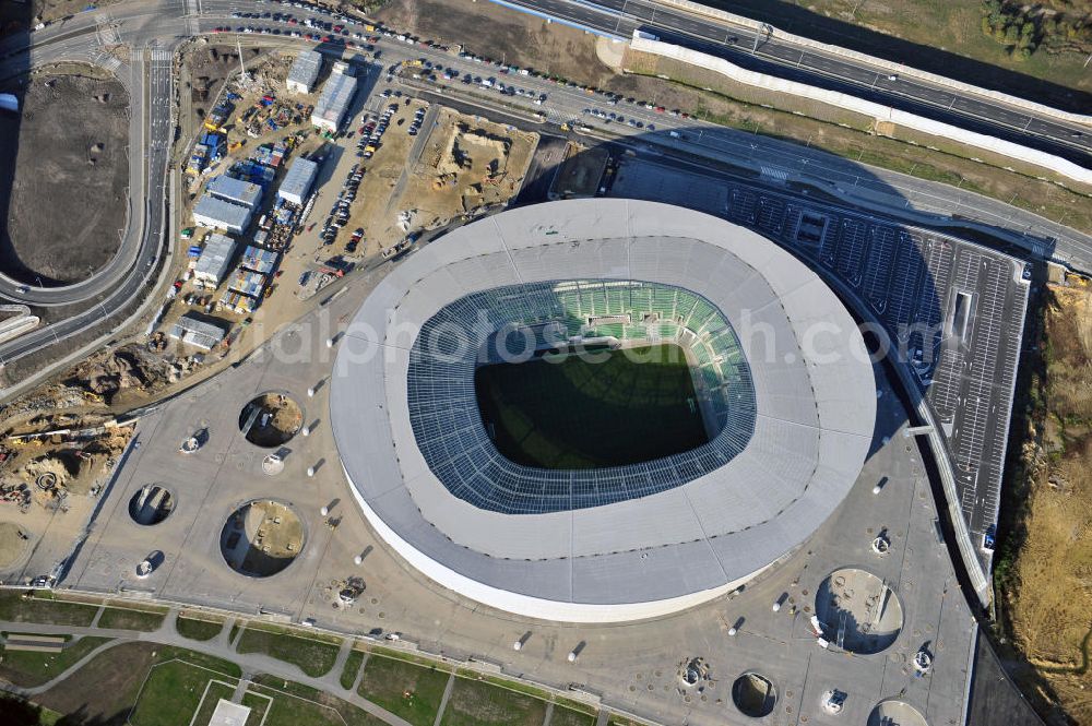 Aerial image Wroclaw / Breslau - Das neu errichtete Stadion Miejski in Breslau, Niederschlesien in Polen. Das Fußballstadion ist ein Austragungsort der UEFA Fußball-Europameisterschaft EM 2012. Errichtet wurde der Stadion- Neubau durch das Bauunternehmen MAX Bögl nach Entwürfen des deutschen Architekturbüros JSK. The new built stadium Miejski in Wroclaw, Lower Silesia in Poland. The soccer stadium is a venue for the UEFA European Football Championship 2012. The stadium was built by the construction company Max Bögl designed by the German architects JSK.