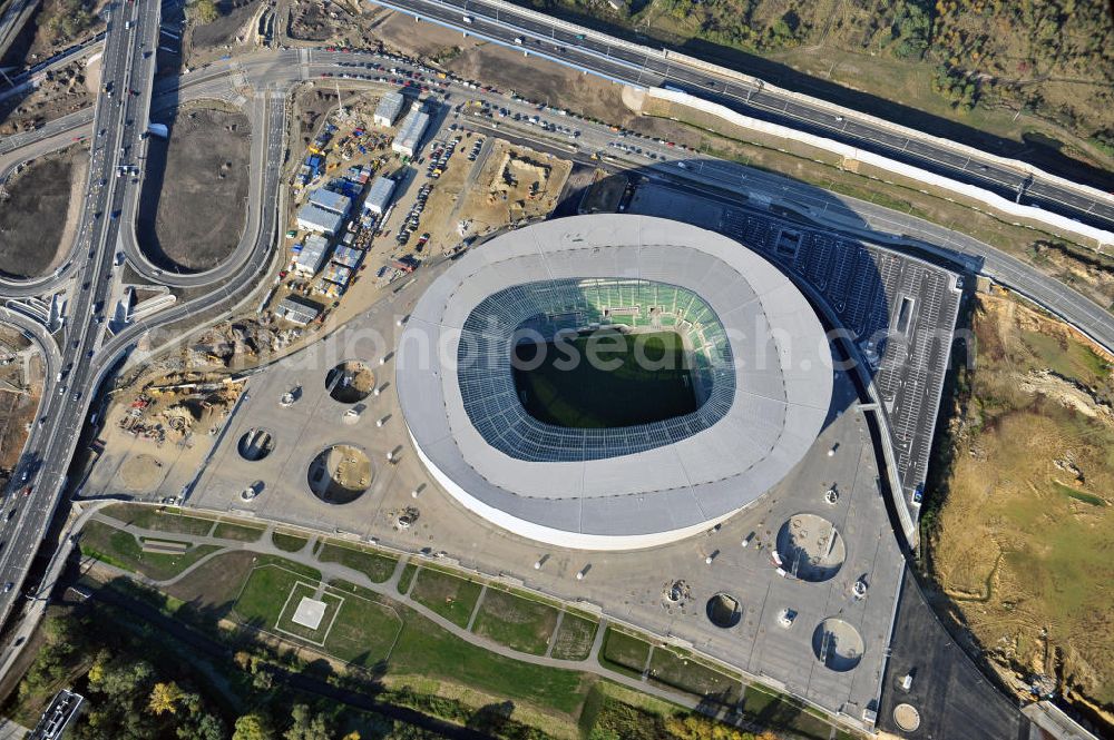 Aerial photograph Wroclaw / Breslau - Das neu errichtete Stadion Miejski in Breslau, Niederschlesien in Polen. Das Fußballstadion ist ein Austragungsort der UEFA Fußball-Europameisterschaft EM 2012. Errichtet wurde der Stadion- Neubau durch das Bauunternehmen MAX Bögl nach Entwürfen des deutschen Architekturbüros JSK. The new built stadium Miejski in Wroclaw, Lower Silesia in Poland. The soccer stadium is a venue for the UEFA European Football Championship 2012. The stadium was built by the construction company Max Bögl designed by the German architects JSK.