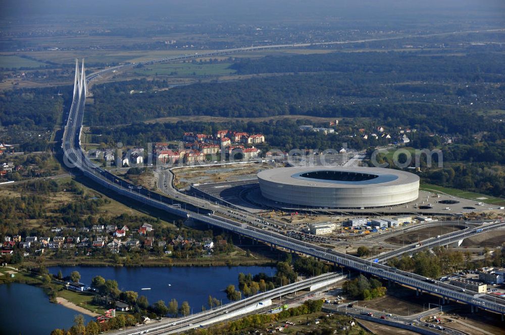 Aerial image Wroclaw / Breslau - Das neu errichtete Stadion Miejski in Breslau, Niederschlesien in Polen. Das Fußballstadion ist ein Austragungsort der UEFA Fußball-Europameisterschaft EM 2012. Errichtet wurde der Stadion- Neubau durch das Bauunternehmen MAX Bögl nach Entwürfen des deutschen Architekturbüros JSK. The new built stadium Miejski in Wroclaw, Lower Silesia in Poland. The soccer stadium is a venue for the UEFA European Football Championship 2012. The stadium was built by the construction company Max Bögl designed by the German architects JSK.