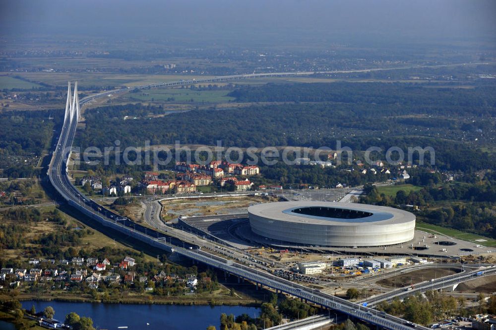 Aerial photograph Wroclaw / Breslau - Das neu errichtete Stadion Miejski in Breslau, Niederschlesien in Polen. Das Fußballstadion ist ein Austragungsort der UEFA Fußball-Europameisterschaft EM 2012. Errichtet wurde der Stadion- Neubau durch das Bauunternehmen MAX Bögl nach Entwürfen des deutschen Architekturbüros JSK. The new built stadium Miejski in Wroclaw, Lower Silesia in Poland. The soccer stadium is a venue for the UEFA European Football Championship 2012. The stadium was built by the construction company Max Bögl designed by the German architects JSK.