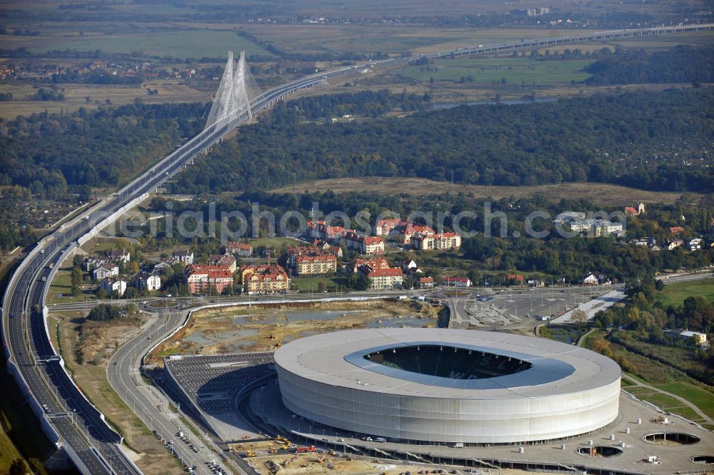 Aerial image Wroclaw / Breslau - Das neu errichtete Stadion Miejski in Breslau, Niederschlesien in Polen. Das Fußballstadion ist ein Austragungsort der UEFA Fußball-Europameisterschaft EM 2012. Errichtet wurde der Stadion- Neubau durch das Bauunternehmen MAX Bögl nach Entwürfen des deutschen Architekturbüros JSK. The new built stadium Miejski in Wroclaw, Lower Silesia in Poland. The soccer stadium is a venue for the UEFA European Football Championship 2012. The stadium was built by the construction company Max Bögl designed by the German architects JSK.