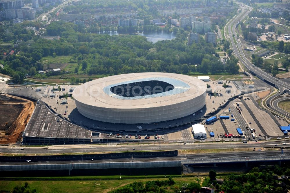 Aerial photograph Wroclaw / Breslau - Blick auf das Stadion Miejski in Breslau, Niederschlesien in Polen. Das Fußballstadion ist ein Austragungsort der UEFA Fußball-Europameisterschaft EM 2012. Errichtet wurde der Stadion- Neubau durch das Bauunternehmen MAX Bögl nach Entwürfen des deutschen Architekturbüros JSK. The new built stadium Miejski in Wroclaw, Lower Silesia in Poland. The soccer stadium is a venue for the UEFA European Football Championship 2012. The stadium was built by the construction company Max Bögl designed by the German architects JSK.