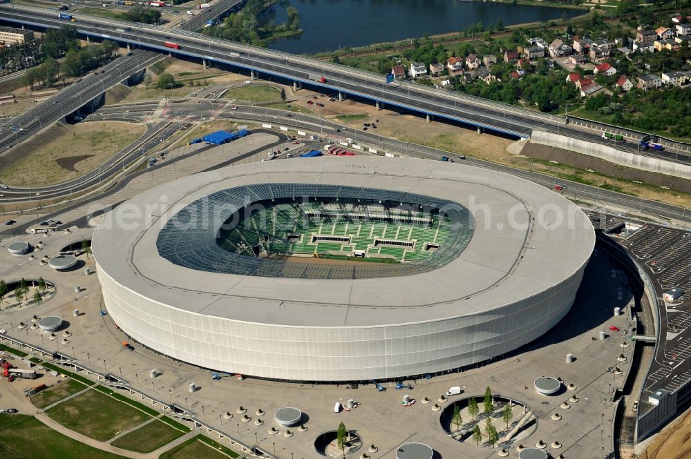 Aerial image Wroclaw / Breslau - Blick auf das Stadion Miejski in Breslau, Niederschlesien in Polen. Das Fußballstadion ist ein Austragungsort der UEFA Fußball-Europameisterschaft EM 2012. Errichtet wurde der Stadion- Neubau durch das Bauunternehmen MAX Bögl nach Entwürfen des deutschen Architekturbüros JSK. The new built stadium Miejski in Wroclaw, Lower Silesia in Poland. The soccer stadium is a venue for the UEFA European Football Championship 2012. The stadium was built by the construction company Max Bögl designed by the German architects JSK.