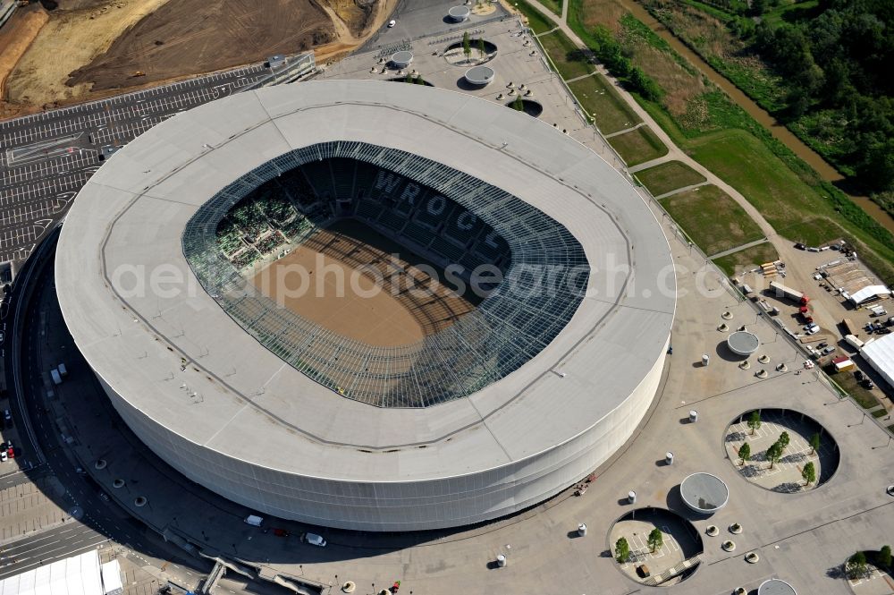 Aerial photograph Wroclaw / Breslau - Blick auf das Stadion Miejski in Breslau, Niederschlesien in Polen. Das Fußballstadion ist ein Austragungsort der UEFA Fußball-Europameisterschaft EM 2012. Errichtet wurde der Stadion- Neubau durch das Bauunternehmen MAX Bögl nach Entwürfen des deutschen Architekturbüros JSK. The new built stadium Miejski in Wroclaw, Lower Silesia in Poland. The soccer stadium is a venue for the UEFA European Football Championship 2012. The stadium was built by the construction company Max Bögl designed by the German architects JSK.