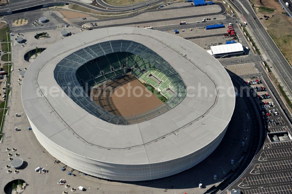 Aerial photograph Wroclaw / Breslau - Blick auf das Stadion Miejski in Breslau, Niederschlesien in Polen. Das Fußballstadion ist ein Austragungsort der UEFA Fußball-Europameisterschaft EM 2012. Errichtet wurde der Stadion- Neubau durch das Bauunternehmen MAX Bögl nach Entwürfen des deutschen Architekturbüros JSK. The new built stadium Miejski in Wroclaw, Lower Silesia in Poland. The soccer stadium is a venue for the UEFA European Football Championship 2012. The stadium was built by the construction company Max Bögl designed by the German architects JSK.